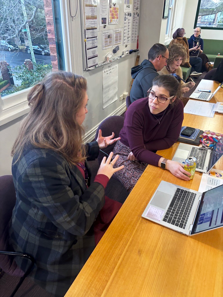 Two teachers consulting