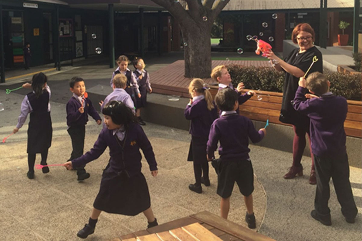 Student exploring play through bubble